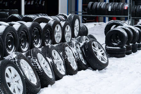 Tire and wheels shop on the street. Seasonal tire change.