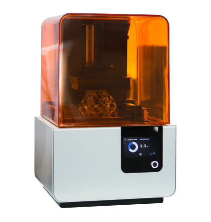 Stereolithography 3d printer isolated on gray background.
