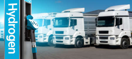 Self service hydrogen filling station on a background of trucks