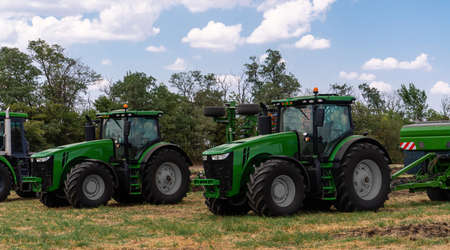 Agricultural machinery park on the field.の写真素材