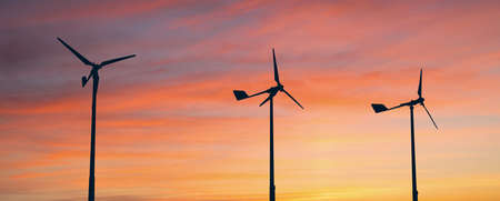 Wind turbines at sunsetの写真素材