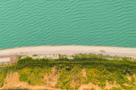 Sea coast. Aerial view of the beach and waves