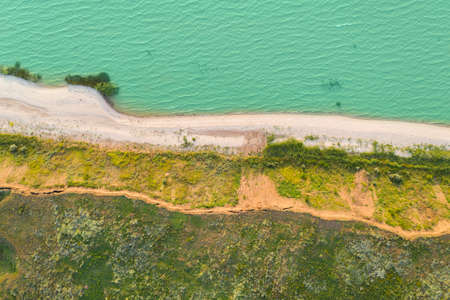 Sea coast. Aerial view of the beach and wavesの写真素材