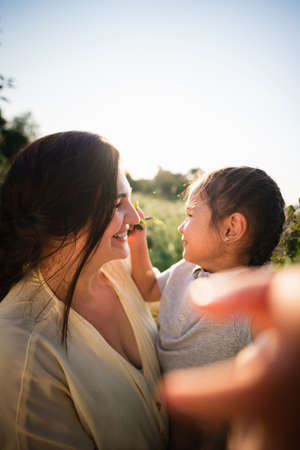 European mother and her Asian daughterの写真素材