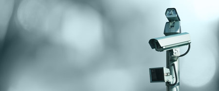 Security camera on a green background