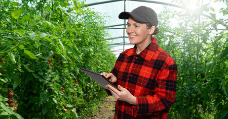 A woman farmer with tablet.