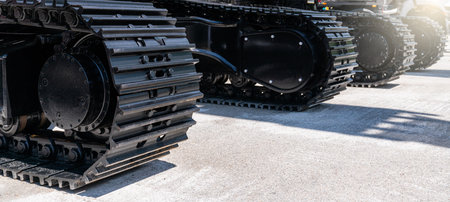 Construction excavator tracks close up. High quality photo