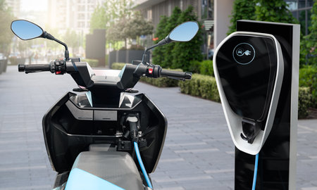Electric scooter with charging station on a city street. High quality photo