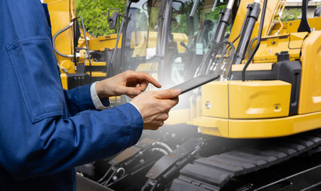 Fleet of yellow construction machines. High quality photo
