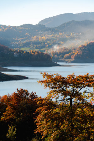 Lake in the mountains at autumn.の写真素材