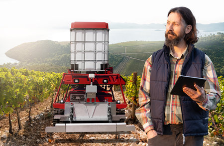 Autonomous robot sprayer works in a vineyard.の写真素材