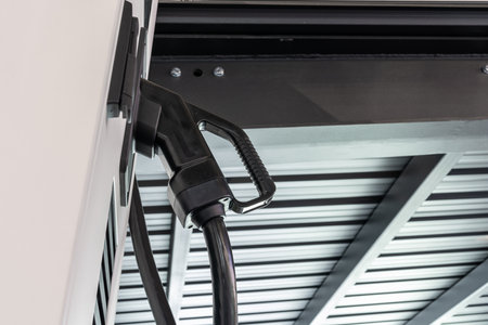 Electric vehicles charging station that takes energy from solar panels. Close up..