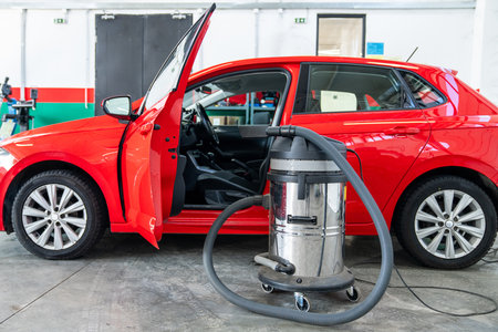 Vacuum cleaner next to the car. Interior dry cleaning.の写真素材