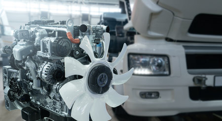 Disassembled engine at a truck repair service.