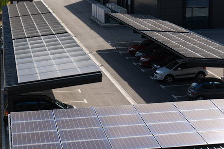 Parking space with solar panels on a roof. Solar canopy.の写真素材