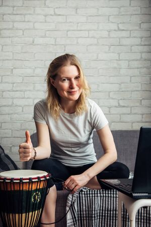 Online music lessons during quarantine due to coronavirus pandemic. Remote teaching to play the...