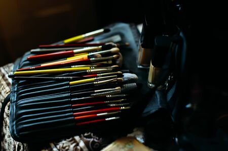 Set of brushes for professional makeup in special black case, close-up. A variety of brushes and applicators, make-up artist tool.の写真素材