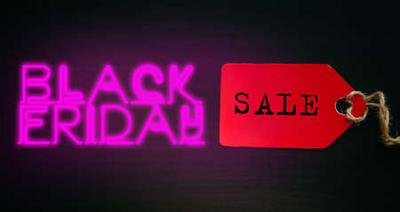Concept of global sale of goods around the world in November. Black Friday in USA. Label with inscription in original design, close-up.の写真素材