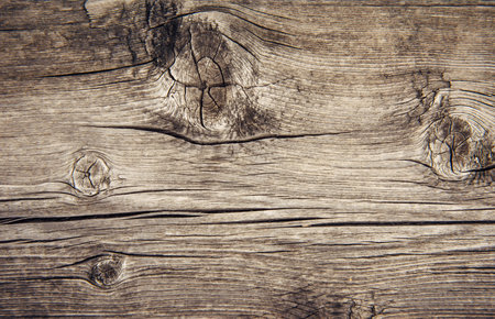 Old wooden background, natural pattern. Dilapidated horizontal plank, close-up.の写真素材