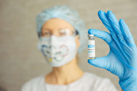 Vial with vaccine female doctorのeditorial素材