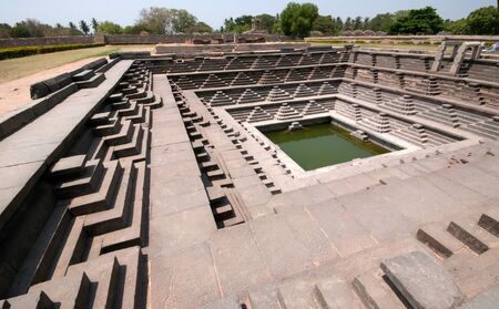 pushkarani stepped tank at hampiの写真素材