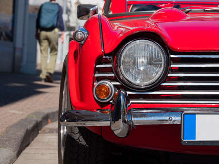 Front light of the red vintage car.のeditorial素材