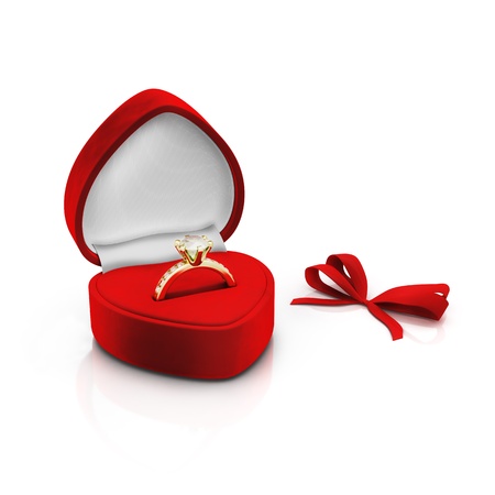 Isolated red ring box with bow on white backgroundの写真素材