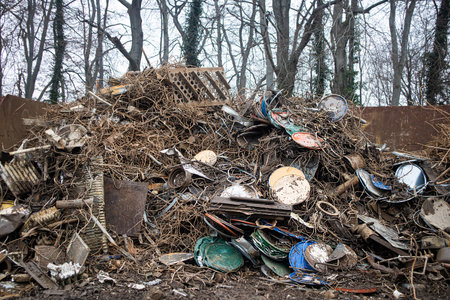 A pile of old scrap metal for recycling and disposal is wire, iron rods .の写真素材