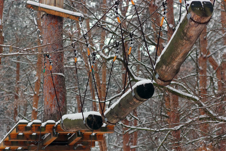 The obstacle course in adventure park winterの写真素材