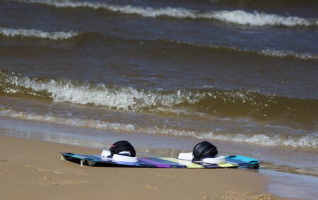 Kitesurfing board on the beach in Ukraine. Close-upの写真素材