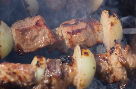 Meat grilled caucasus barbecue in smoke. Clouse-upの写真素材