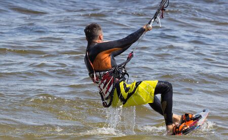 kitesurfer glides view from the back. Ukraineの写真素材