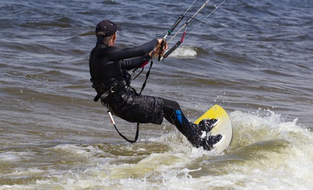 kitesurfer glides view from the back. Ukraineの写真素材