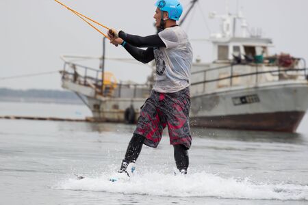 Lazurnoe , Ukraine, August 23, 2015:  Festival of music and sports Crayzy Day , Wakeboarder making...
