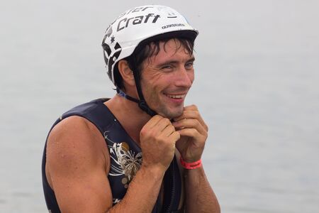 Lazurnoe , Ukraine, August 23, 2015:  Festival of music and sports Crayzy Day , Wakeboarder making tricks on sunsetのeditorial素材