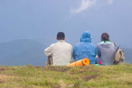 Happy Hikers at Top of Mountain Goverla in Ukraineの写真素材