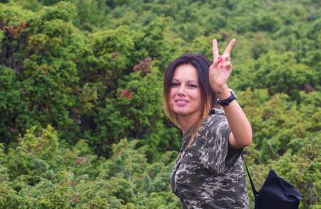GOVERLA, UKRAINE - SEPTEMBER 20, 2015 : A group of tourists climbs to the highest mountain of Ukraine Hoverla 2061 METER on SEPTEMBER 20, 2015のeditorial素材