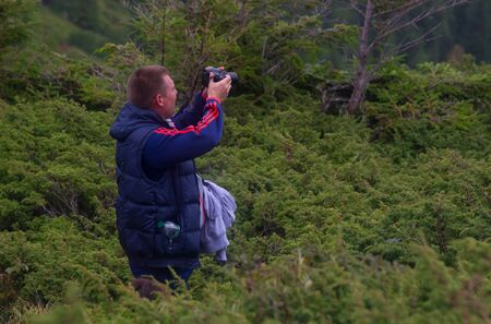 GOVERLA, UKRAINE - SEPTEMBER 20, 2015 : A group of tourists climbs to the highest mountain of Ukraine Hoverla 2061 METER on SEPTEMBER 20, 2015のeditorial素材
