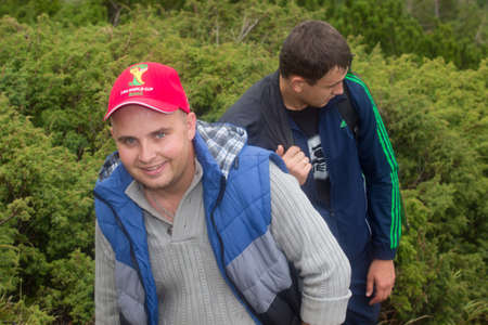 GOVERLA, UKRAINE - SEPTEMBER 20, 2015 : A group of tourists climbs to the highest mountain of Ukraine Hoverla 2061 METER on SEPTEMBER 20, 2015のeditorial素材