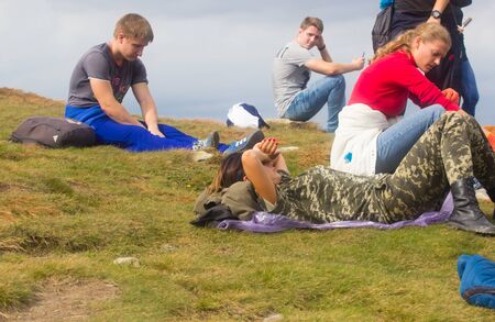 GOVERLA, UKRAINE - SEPTEMBER 20, 2015 : A group of tourists climbs to the highest mountain of Ukraine Hoverla 2061 METER on SEPTEMBER 20, 2015のeditorial素材