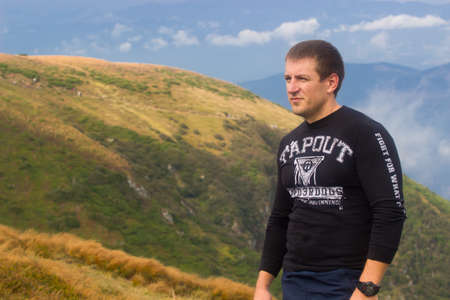 GOVERLA, UKRAINE - SEPTEMBER 20, 2015 : A group of tourists climbs to the highest mountain of Ukraine Hoverla 2061 METER on SEPTEMBER 20, 2015のeditorial素材