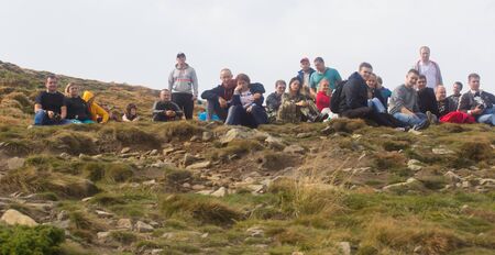GOVERLA, UKRAINE - SEPTEMBER 20, 2015 : A group of tourists climbs to the highest mountain of Ukraine Hoverla 2061 METER on SEPTEMBER 20, 2015のeditorial素材