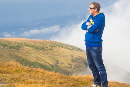 GOVERLA, UKRAINE - SEPTEMBER 20, 2015 : A group of tourists climbs to the highest mountain of Ukraine Hoverla 2061 METER on SEPTEMBER 20, 2015のeditorial素材