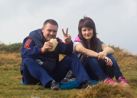 GOVERLA, UKRAINE - SEPTEMBER 20, 2015 : A group of tourists climbs to the highest mountain of Ukraine Hoverla 2061 METER on SEPTEMBER 20, 2015のeditorial素材