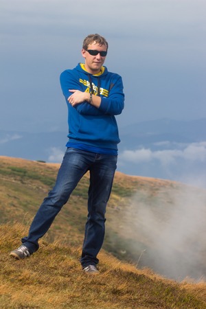 GOVERLA, UKRAINE - SEPTEMBER 20, 2015 : A group of tourists climbs to the highest mountain of Ukraine Hoverla 2061 METER on SEPTEMBER 20, 2015のeditorial素材