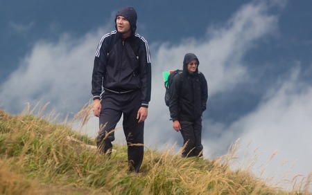 GOVERLA, UKRAINE - SEPTEMBER 20, 2015 : A group of tourists climbs to the highest mountain of Ukraine Hoverla 2061 METER on SEPTEMBER 20, 2015のeditorial素材