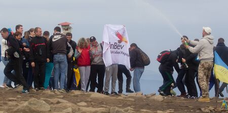 GOVERLA, UKRAINE - SEPTEMBER 20, 2015 : A group of tourists climbs to the highest mountain of Ukraine Hoverla 2061 METER on SEPTEMBER 20, 2015のeditorial素材