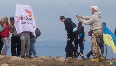 GOVERLA, UKRAINE - SEPTEMBER 20, 2015 : A group of tourists climbs to the highest mountain of Ukraine Hoverla 2061 METER on SEPTEMBER 20, 2015のeditorial素材