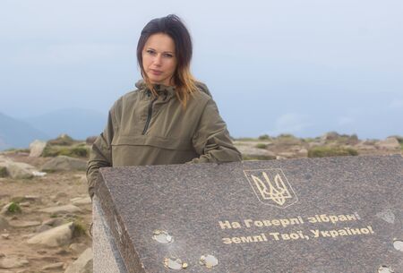 GOVERLA, UKRAINE - SEPTEMBER 20, 2015 : A group of tourists climbs to the highest mountain of Ukraine Hoverla 2061 METER on SEPTEMBER 20, 2015のeditorial素材