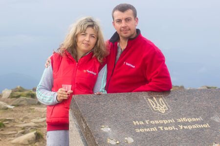 GOVERLA, UKRAINE - SEPTEMBER 20, 2015 : A group of tourists climbs to the highest mountain of Ukraine Hoverla 2061 METER on SEPTEMBER 20, 2015のeditorial素材